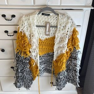 Size medium sweater purchased from a boutique in Los Angeles
